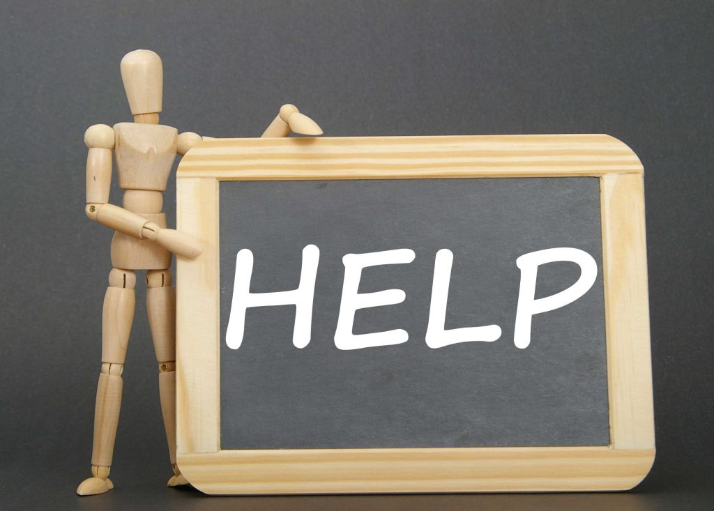 Image showing chalkboard with word "help" written on it